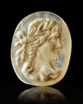 AN AGATE CAMEO OF A BUST OF APOLLO, 1ST/2ND CENTURY AD