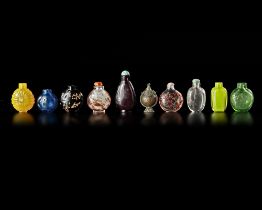 A COLLECTION OF 10 SNUFF BOTTLES IN VARIOUS MATERIALS, QING DYNASTY (1662-1912)