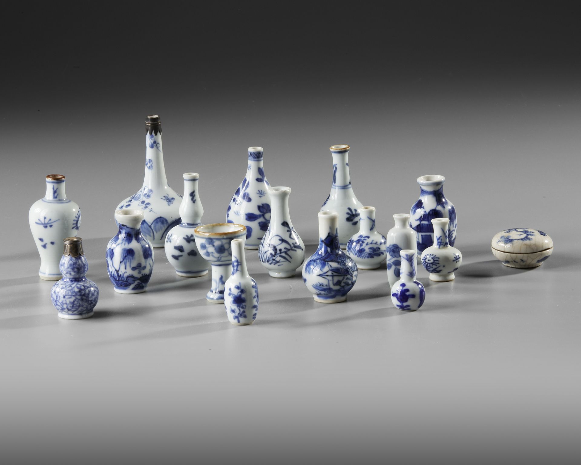 A COLLECTION OF 17 BLUE AND WHITE MINIATURE VASES, KANGXI-QIANLONG PERIOD AND LATER - Image 2 of 3