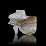 AN EYE OF HORUS IN BANDED AGATE, NORTH AFRICAN, HELLENESTIC PERIOD, 2ND TO 1ST CENTURY BC