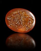 A ROMAN CARNELIAN INTAGLIO OF A GRYLLOS, 1ST CENTURY AD