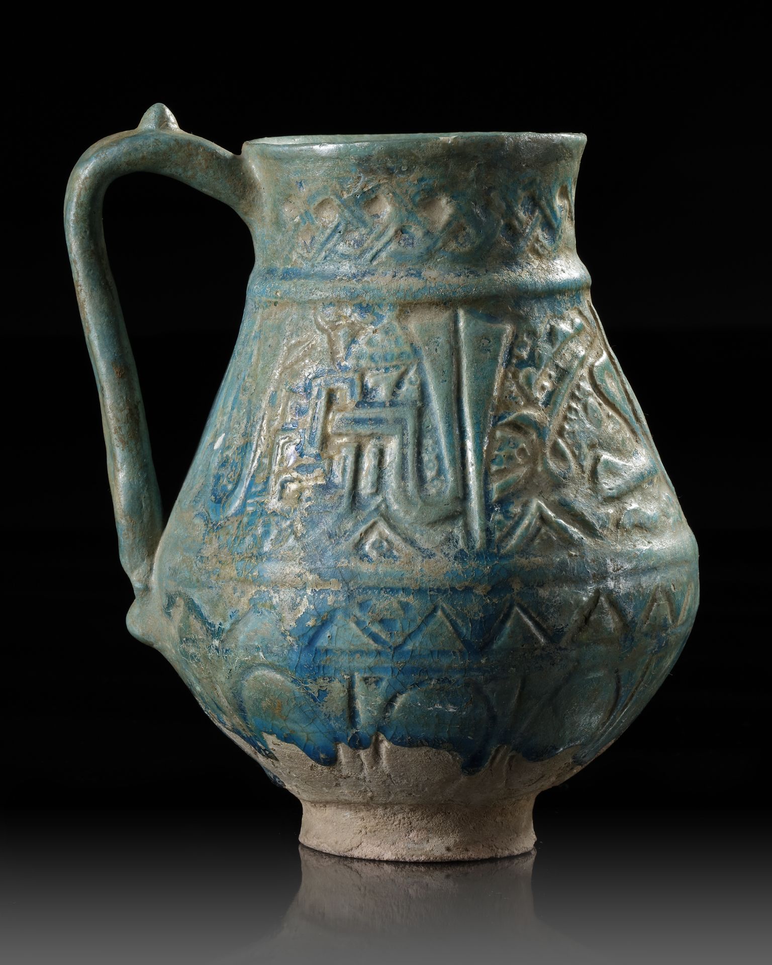 A TURQUOISE GLAZED POTTERY EWER, PROBABLY NISHAPUR, 12TH CENTURY - Image 5 of 8