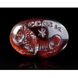 A SASSANIAN INTAGLIO WITH A RECLINING LION, 4TH CENTURY BC