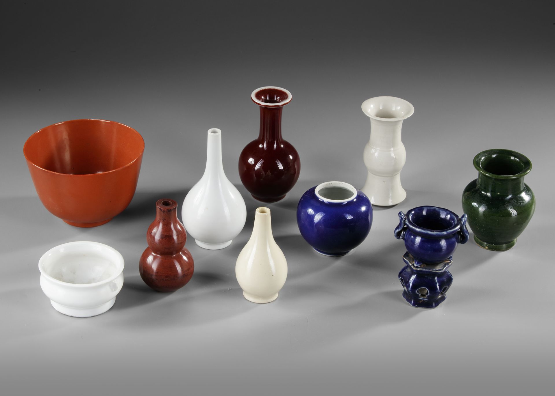 A CHINESE COLLECTION OF 10 MONOCHROME GLAZED PORCELAIN VESSELS, 19TH CENTURY AND LATER