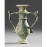 A BRONZE BYZANTINE LAMP WITH TWO HANDLES, 5TH-6TH CENTURY AD