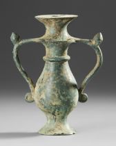 A BRONZE BYZANTINE LAMP WITH TWO HANDLES, 5TH-6TH CENTURY AD