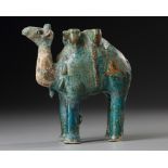 A TURQUOISE GLAZED POTTERY FIGURE OF A CAMEL, KASHAN, PERSIA, 11TH-12TH CENTURY