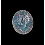 AN INTAGLIO WITH A BUST OF SOL, 1ST-2ND CENTURY AD