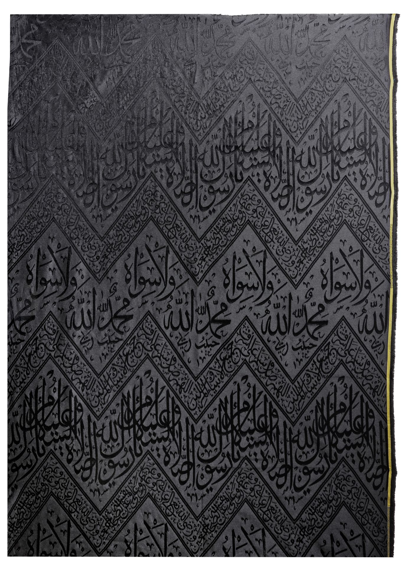A BLACK KABAA KISWAH TEXTILE FRAGMENT, SAUDIA ARABIA, 20TH CENTURY