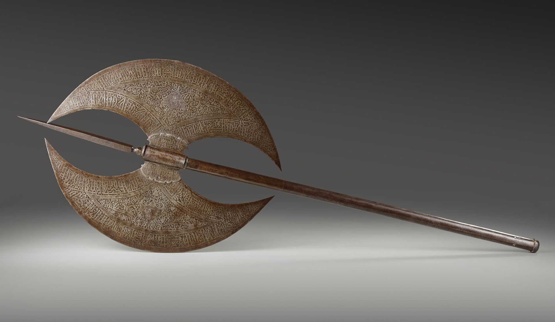 A LARGE QAJAR DOUBLE HEAD AXE, PERSIA, 19TH CENTURY