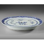 A CHINESE BLUE AND WHITE SERVING PLATTER WITH A STRAINER, 18TH CENTURY
