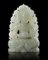 A CHINESE CARVED JADE SEATED BUDDHA, QING DYNASTY (1644–1911)