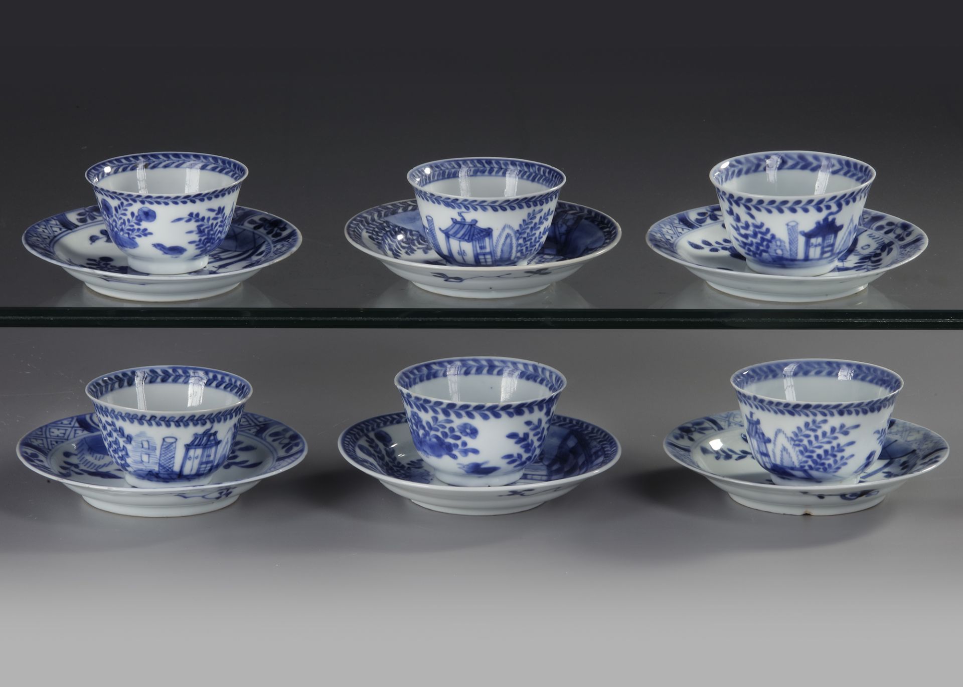 SIX CHINESE BLUE AND WHITE 'CUCKOO IN THE HOUSE' CUPS AND SAUCERS, 18TH CENTURY - Image 3 of 4