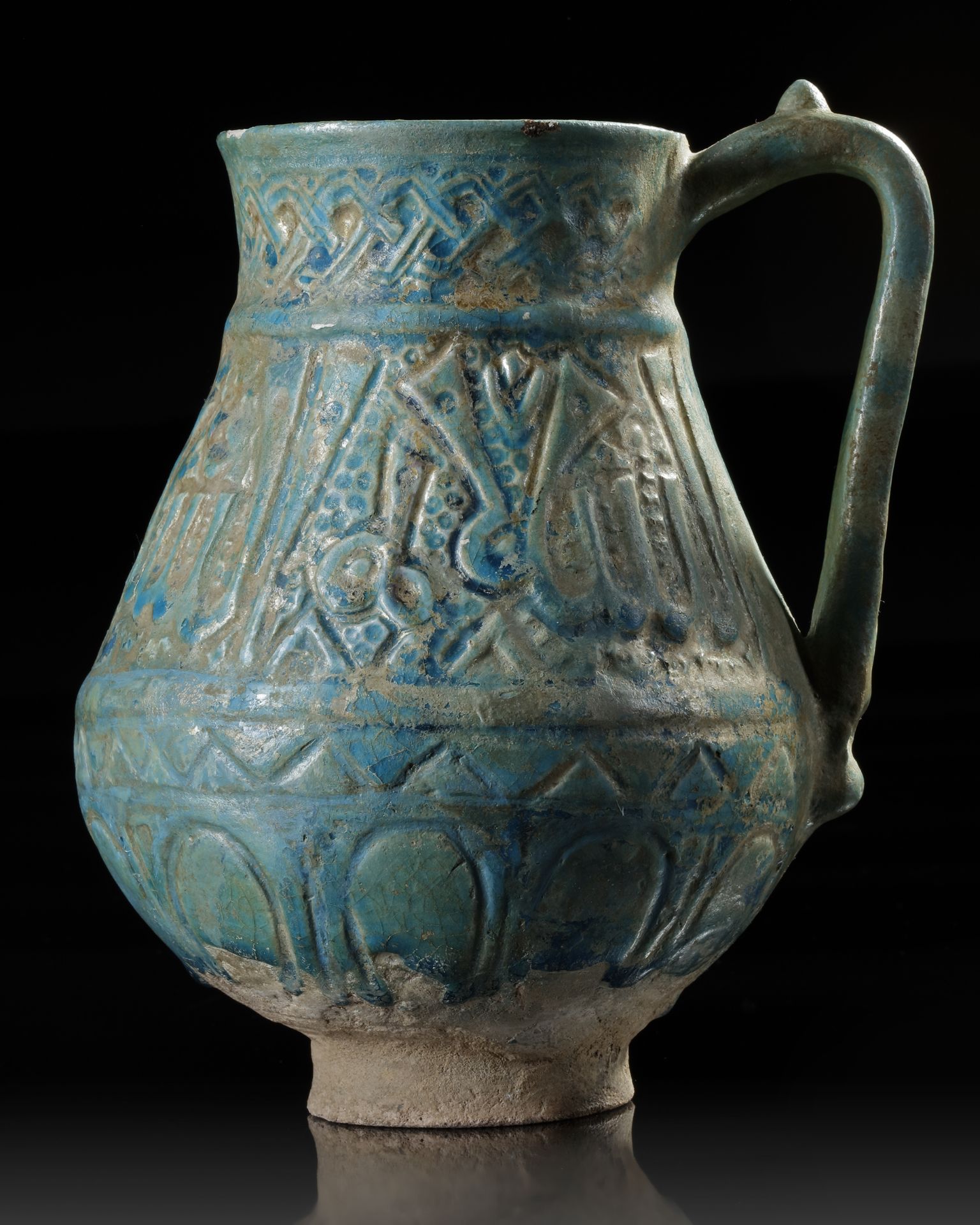A TURQUOISE GLAZED POTTERY EWER, PROBABLY NISHAPUR, 12TH CENTURY - Image 2 of 8