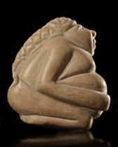 A NEAR EASTERN SEAL OF A SEATED WOMAN, 3RD MILLENNIUM BC