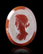 A ROMAN CARNELIAN INTAGLIO OF A WOMAN, ANTONINE 2ND CENTURY AD