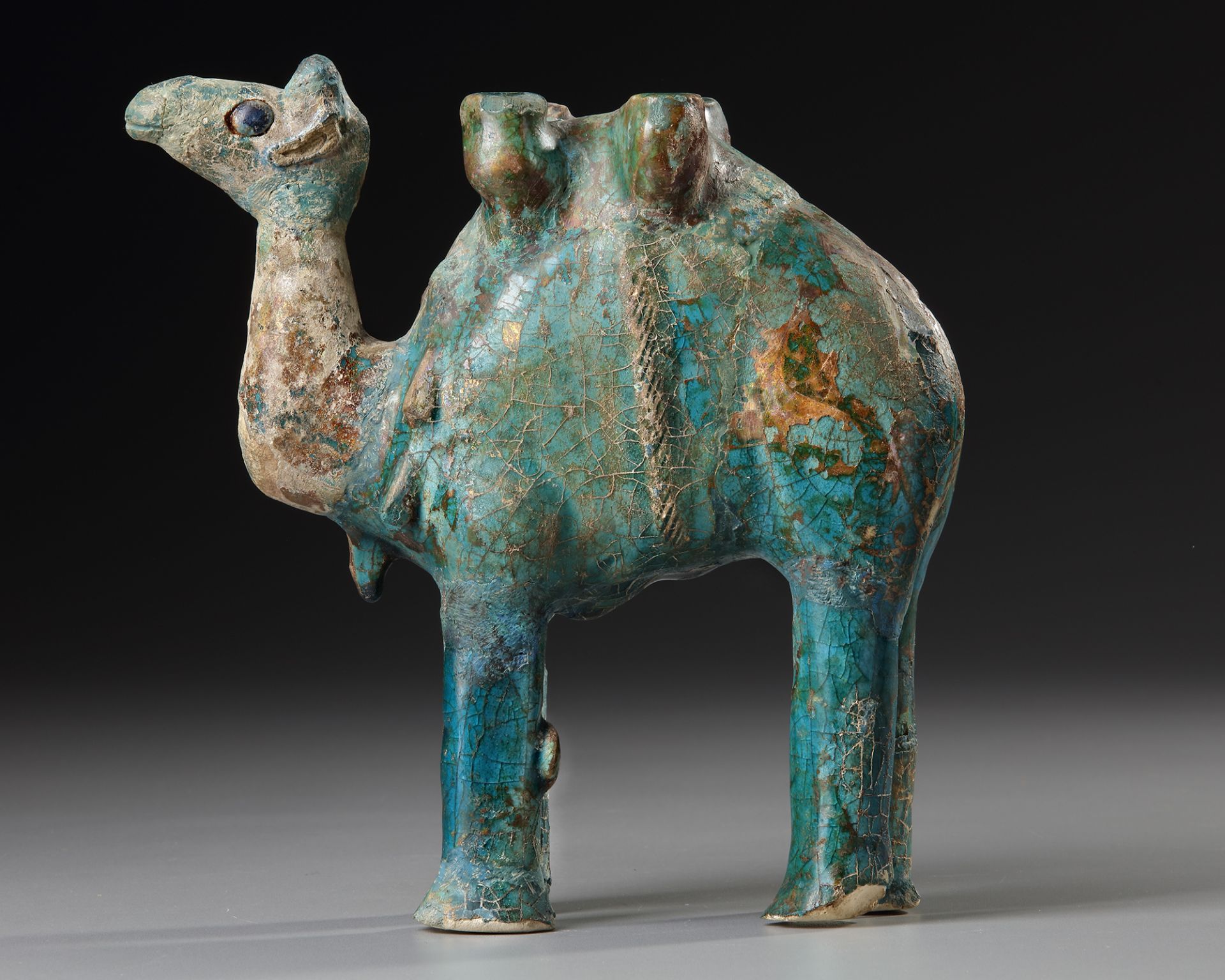 A TURQUOISE GLAZED POTTERY FIGURE OF A CAMEL, KASHAN, PERSIA, 11TH-12TH CENTURY - Bild 2 aus 4