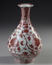 A CHINESE COPPER-RED FLORAL PEAR SHAPED VASE, QING DYNASTY (1644-1911)
