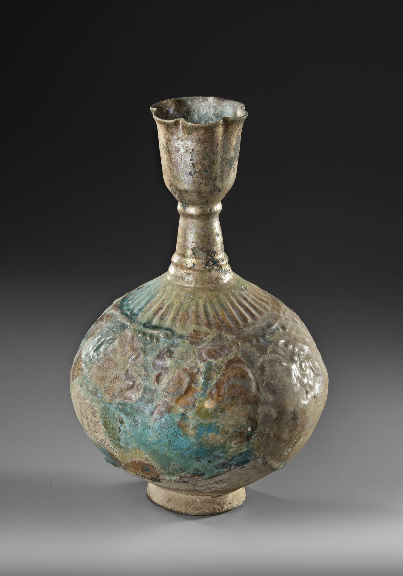 A KASHAN TURQUOISE GLAZED MOULDED BOTTLE VASE, PERSIA, 12TH CENTURY - Image 2 of 4