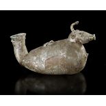 A GLASS BOTTLE IN THE SHAPE OF AN ANIMAL, ROMAN CA. 3RD CENTURY BC