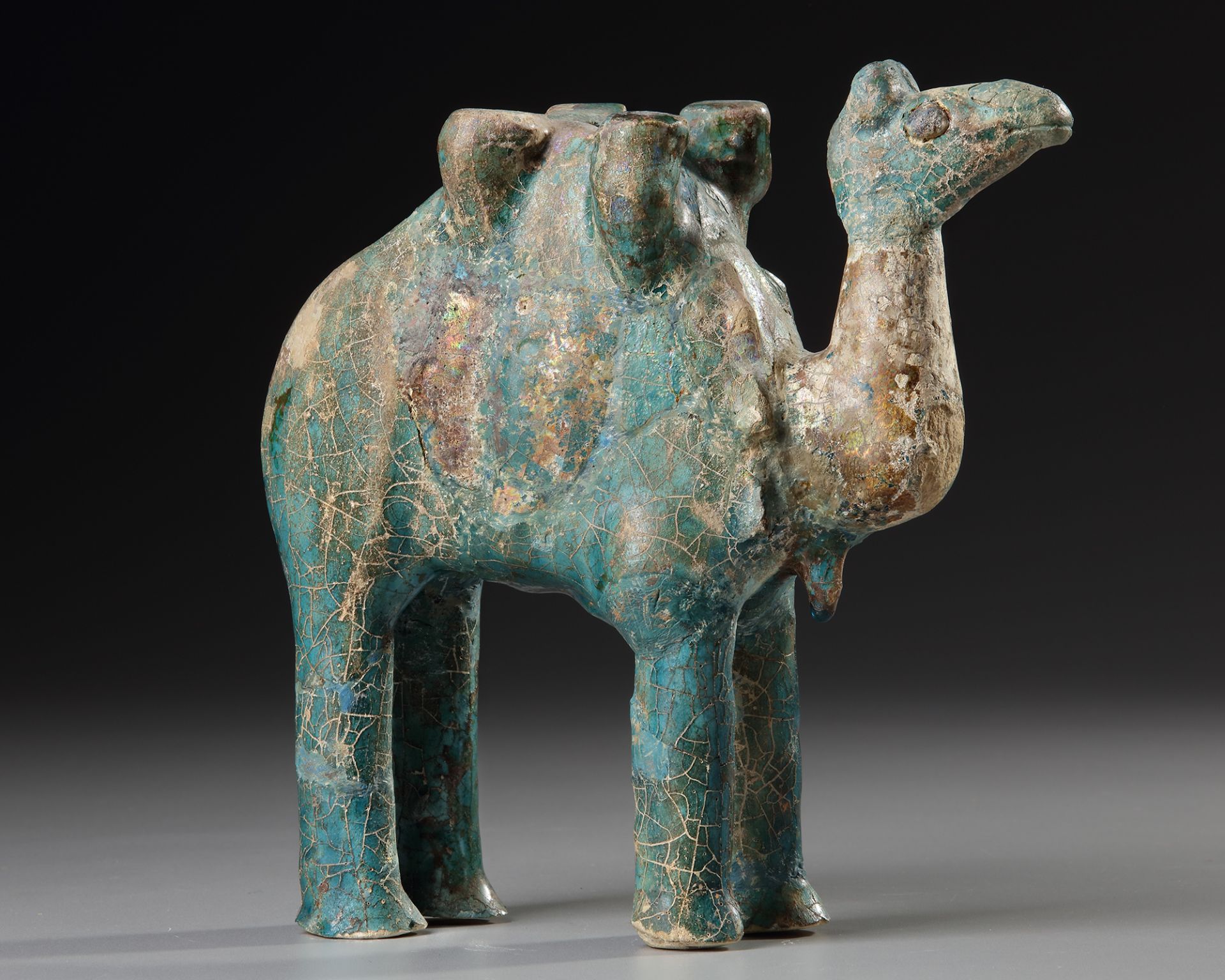 A TURQUOISE GLAZED POTTERY FIGURE OF A CAMEL, KASHAN, PERSIA, 11TH-12TH CENTURY - Image 3 of 4