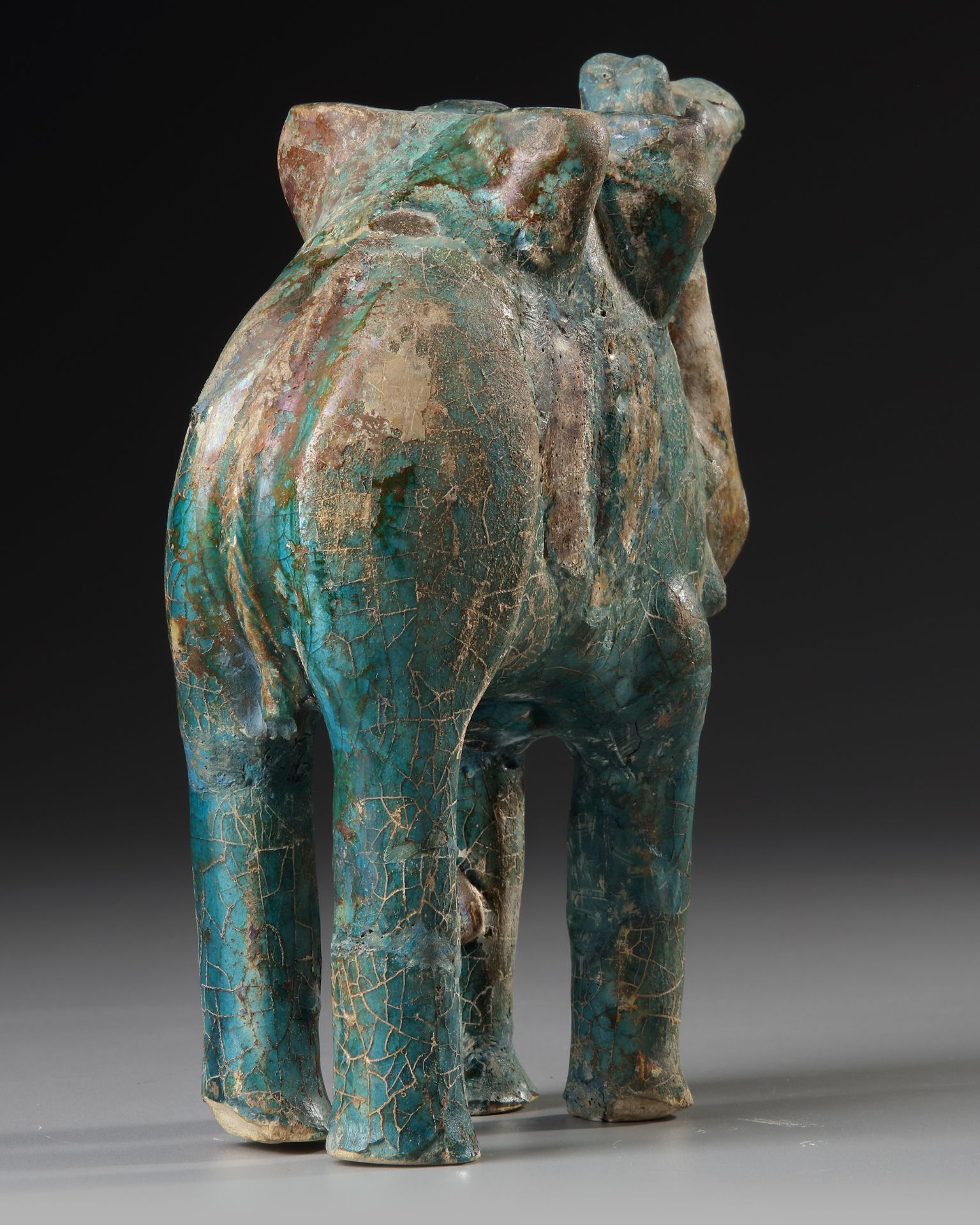 A TURQUOISE GLAZED POTTERY FIGURE OF A CAMEL, KASHAN, PERSIA, 11TH-12TH CENTURY - Image 4 of 4