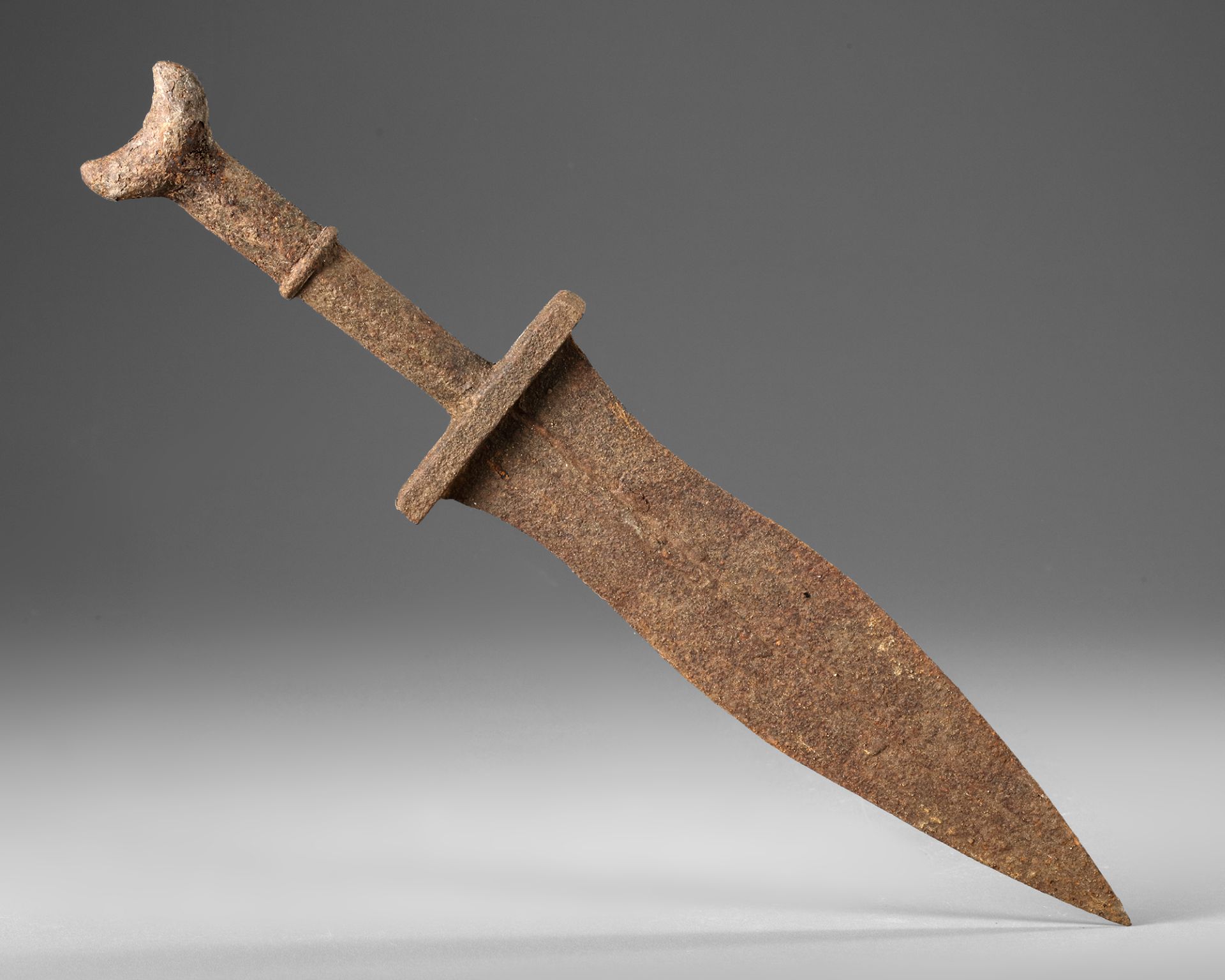 AN IRON PUGLIO OR SHORT DAGGER, ROMAN, 1ST CENTURY AD