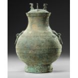 A CHINESE BRONZE RITUAL HU VASE, HAN DYNASTY (206 BC-220 AD) OR LATER