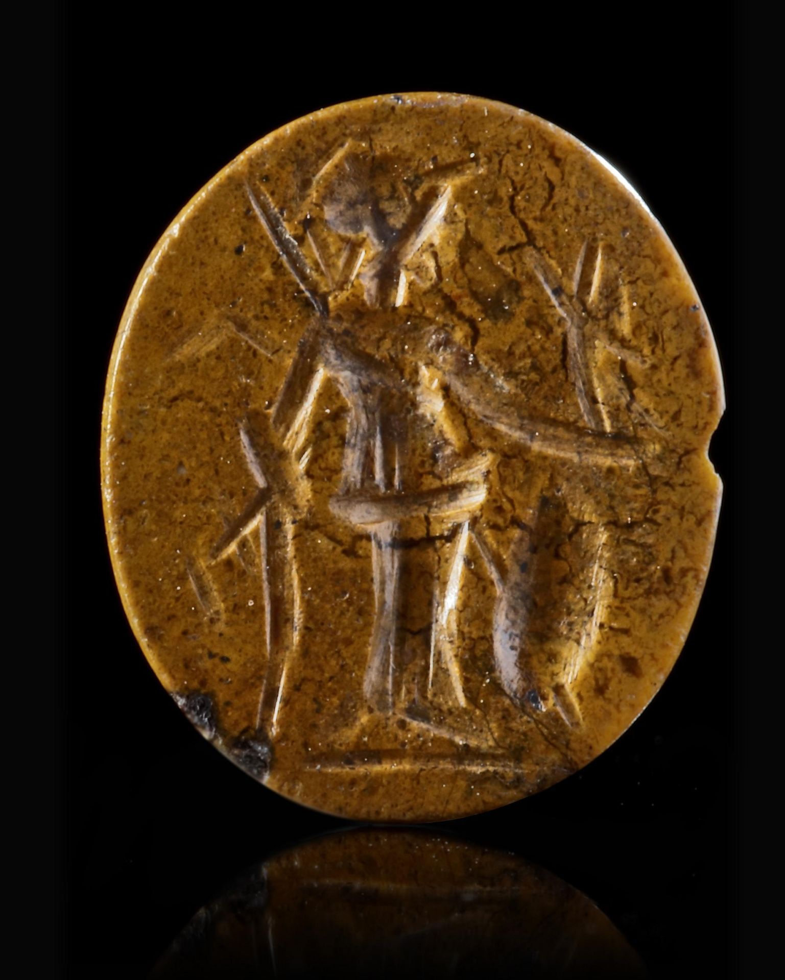 A ROMAN YELLOW JASPER INTAGLIO OF MINERVA, 2ND-3RD CENTURY AD