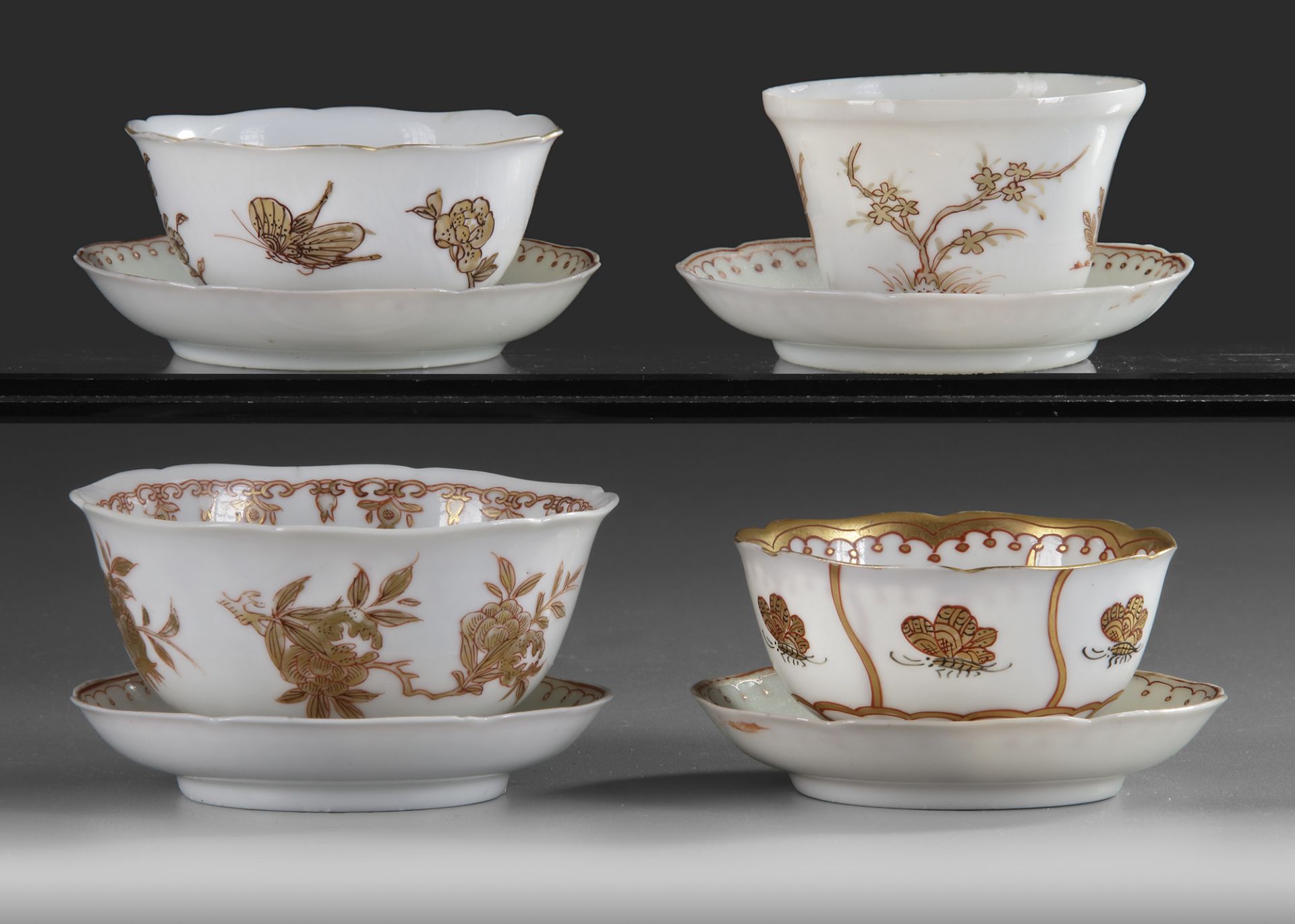 FOUR GILT CHINESE CUPS AND FOUR SAUCERS, 18TH CENTURY