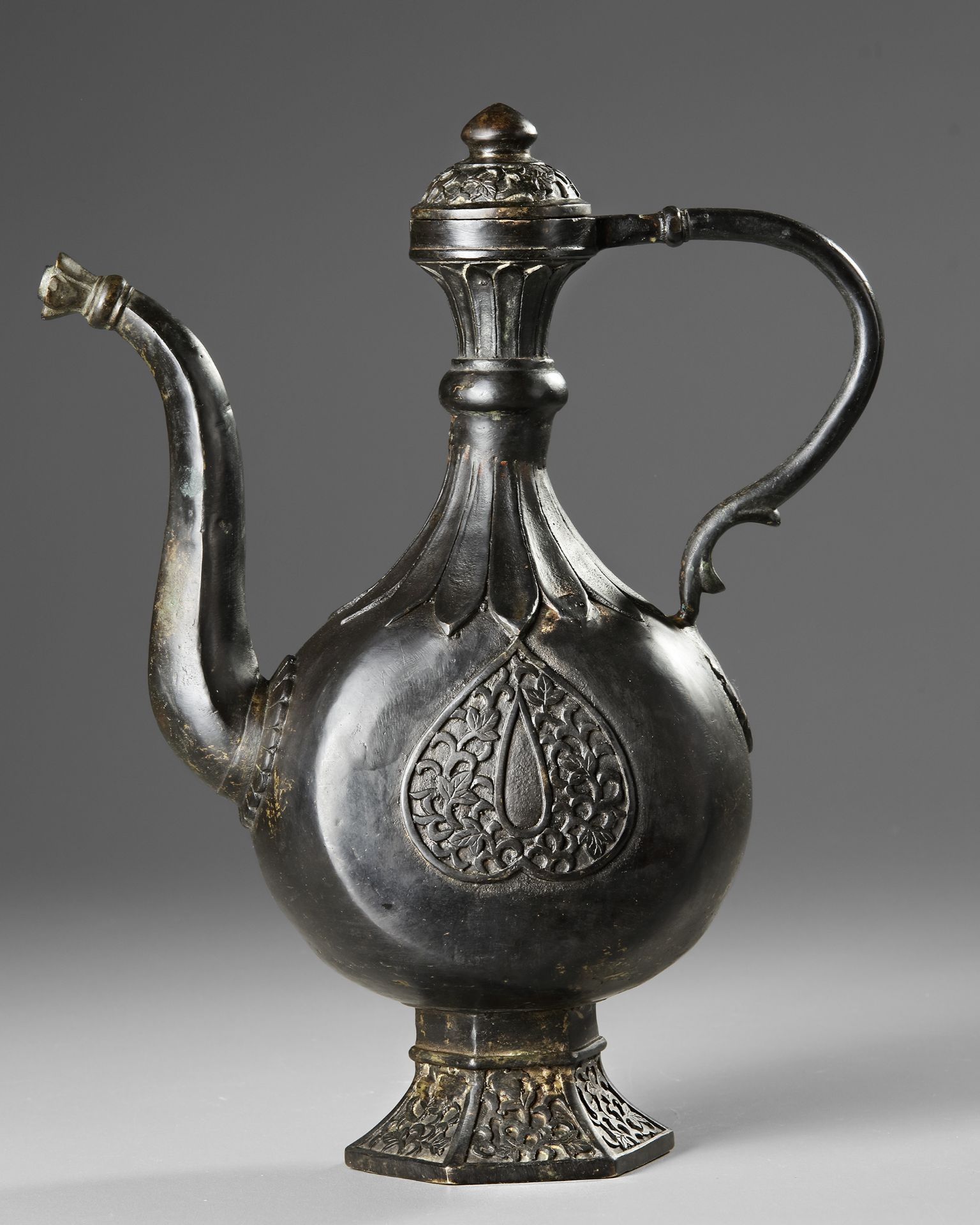 A DECCANI CAST BRASS EWER, INDIA, 17TH CENTURY OR LATER