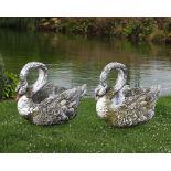 A PAIR OF COMPOSITION STONE PLANTERS MODELED AS SWANS, SECOND HALF 20TH CENTURY