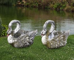 A PAIR OF COMPOSITION STONE PLANTERS MODELED AS SWANS, SECOND HALF 20TH CENTURY