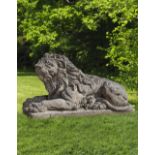 A SCULPTED LIMESTONE MODEL OF A RECUMBENT LION, SECOND HALF 20TH CENTURY