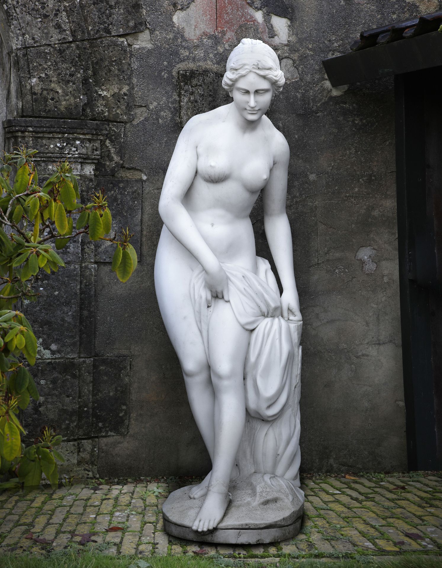 A SCULPTED MARBLE MODEL OF VENUS BATHING ‘VENUS AU BAIN’, LATE 20TH CENTURY, AFTER ETIENNE- MAURICE