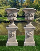 A PAIR OF CARVED LIMESTONE GARDEN URNS, LATE 20TH CENTURY