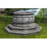 A LARGE CARVED STONE OCTAGONAL WELLHEAD/PLANTER, LATE 19TH CENTURY