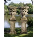 A PAIR OF CARVED LIMESTONE GARDEN URNS, LATE 19TH CENTURY