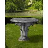 A CARVED LIMESTONE GARDEN TABLE IN THE EARLY 19TH CENTURY STYLE, SECOND HALF 20TH CENTURY