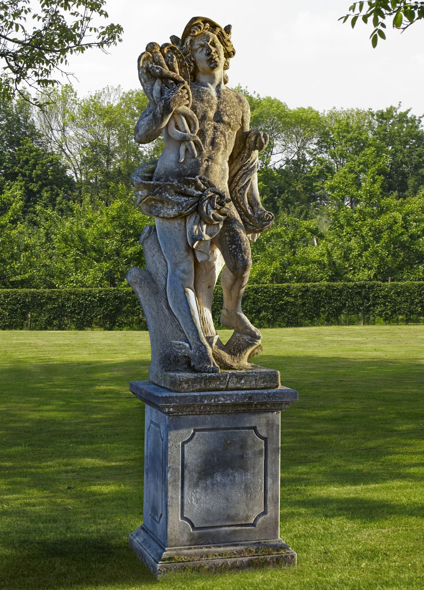 A NORTH ITALIAN SCULPTED LIMESTONE GARDEN MODEL OF MERCURY, 20TH CENTURY