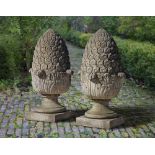 A PAIR OF CARVED LIMESTONE PIER FINIALS, 20TH CENTURY