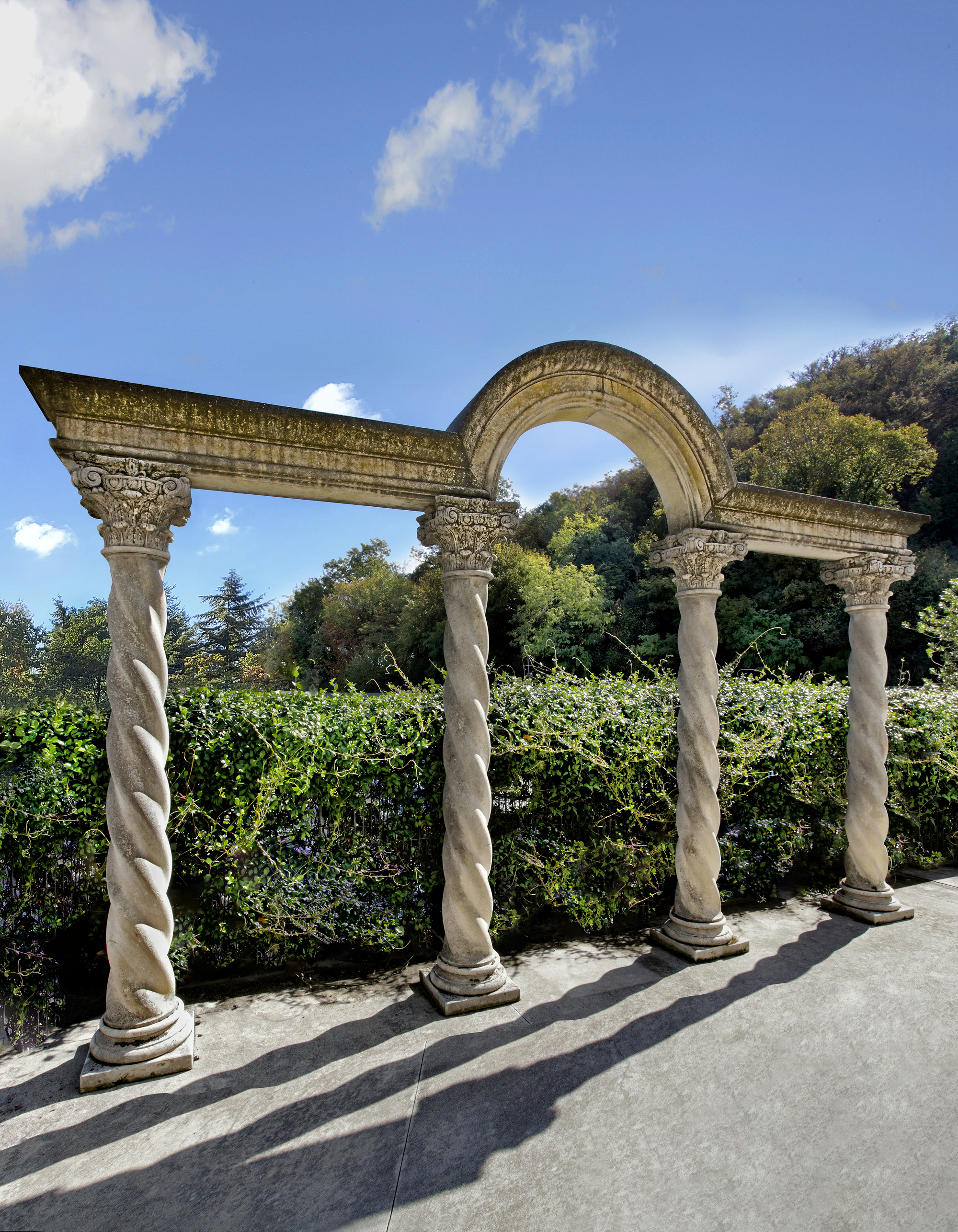 A CARVED LIMESTONE ARCADE, SECOND HALF 20TH CENTURY