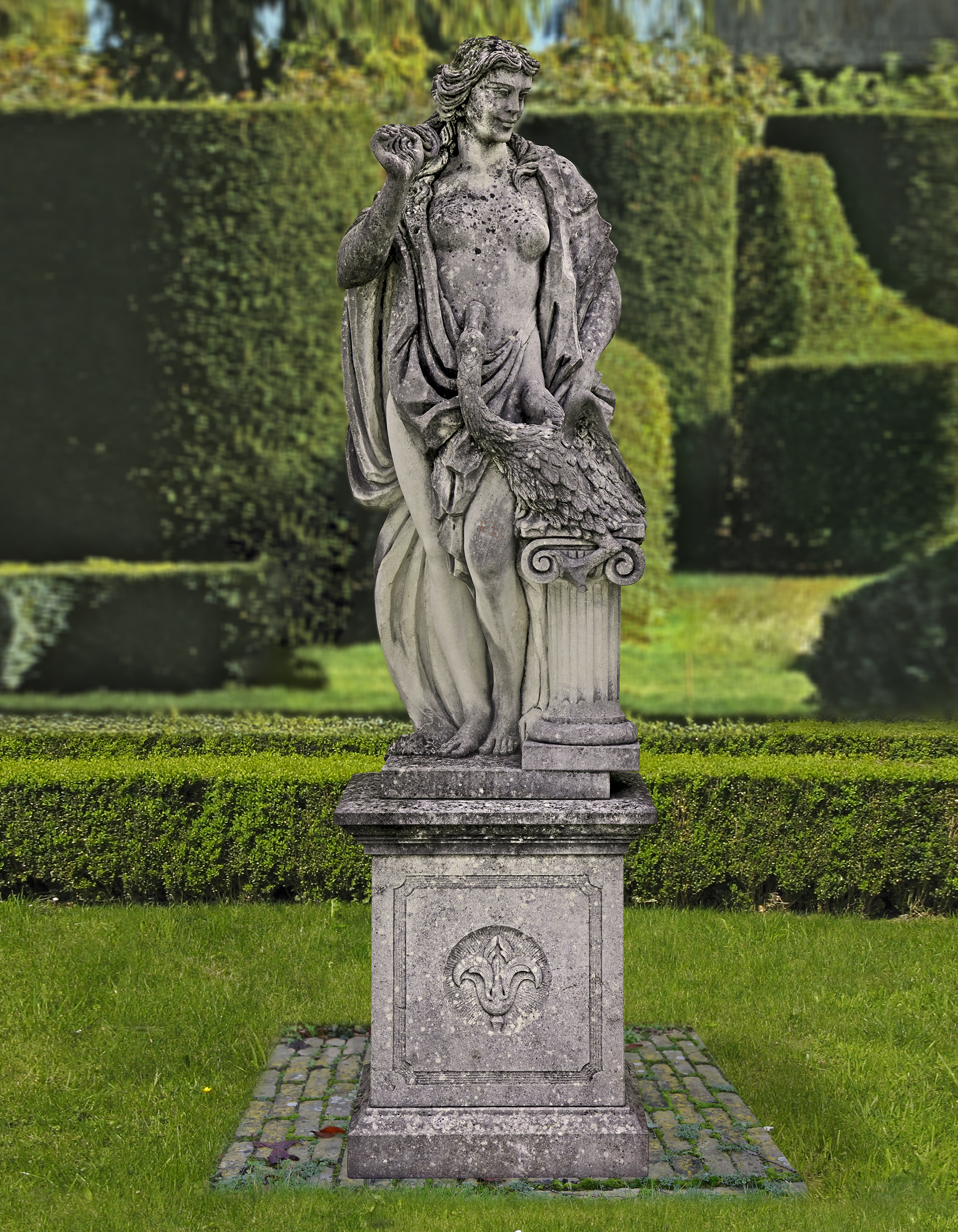 A SCULPTED LIMESTONE GROUP OF LEDA AND THE SWAN, LATE 20TH CENTURY