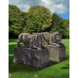 A PAIR OF SCULPTED LIMESTONE MODELS OF LIONS, SECOND HALF 20TH CENTURY