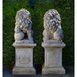 A PAIR OF SCULPTED LIMESTONE MODELS OF LIONS ON PEDESTALS, SECOND HALF 20TH CENTURY