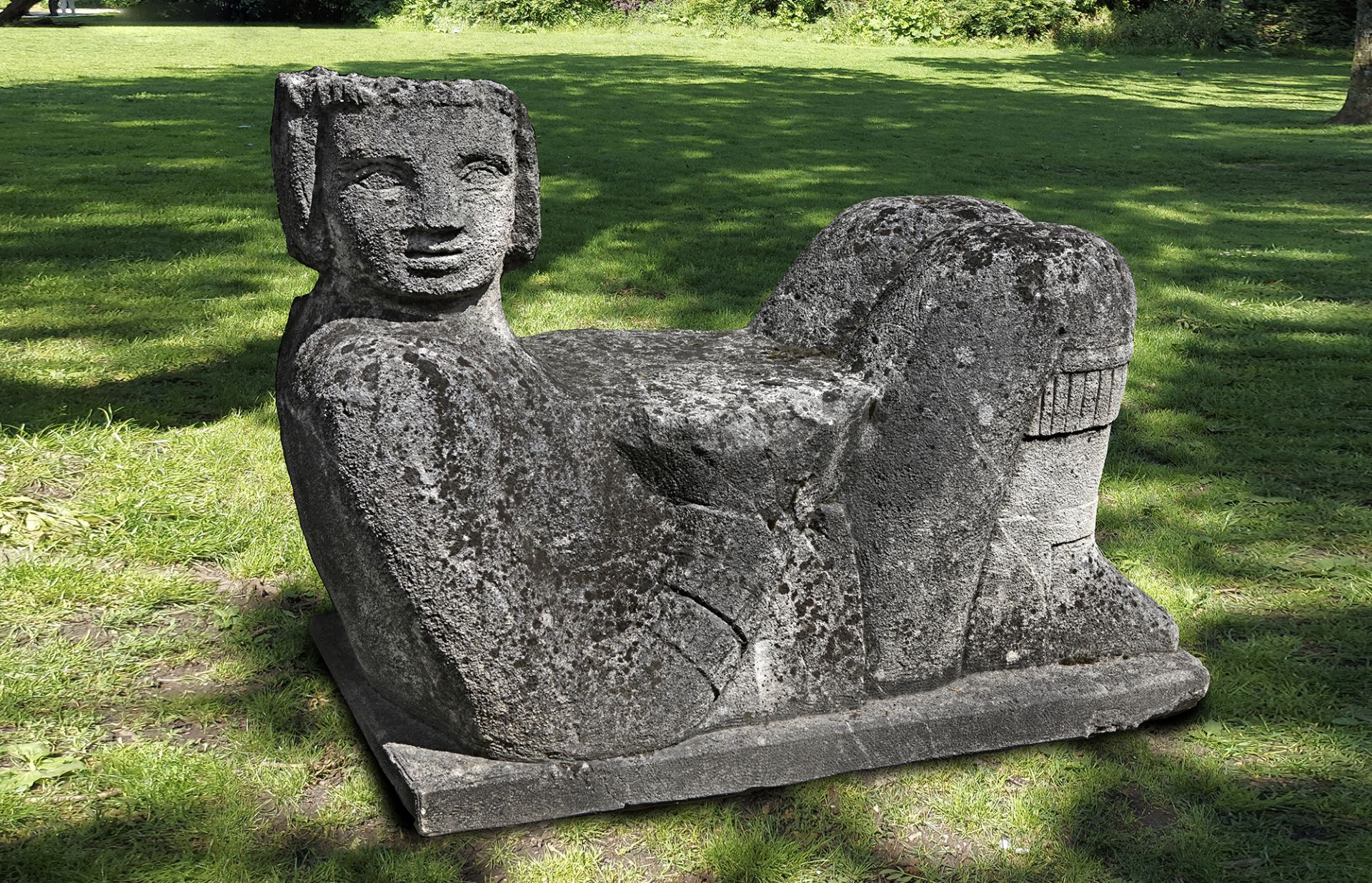 A CARVED LIMESTONE FIGURAL GARDEN SEAT IN THE MESOAMERICAN STYLE, EARLY 20TH CENTURY