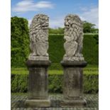 A PAIR OF SCULPTED LIMESTONE MODELS OF HERALDIC LIONS, SECOND HALF 20TH CENTURY