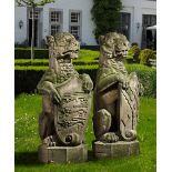 A PAIR SCULPTED SANDSTONE PIER FINIALS CARVED AS HERALDIC LIONS ALMOST CERTAINLY ENGLISH, 19TH CENTU