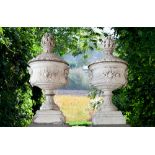 A PAIR OF ORNATELY CARVED WHITE MARBLE URNS AND COVERS, LATE 19TH OR EARLY 20TH CENTURY