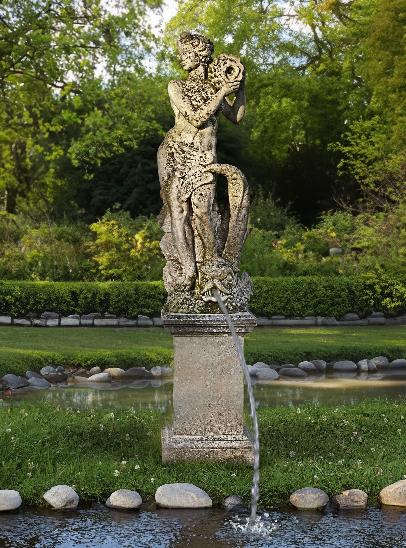 A CARVED LIMESTONE FOUNTAIN FIGURE REPRESENTING SALACIA (GODDESS OF THE SEA, WIFE OF NEPTUNE), SECON